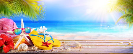 Vacation Concept - Beach Accessories On Table In Tropical Seascapeの写真素材