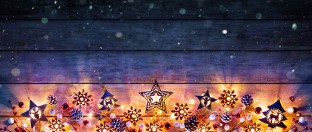 Christmas Lights And Decoration On Rustic Wooden Plankの写真素材