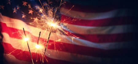 Vintage Celebration With Sparklers And Defocused American Flag - Independence Dayの写真素材