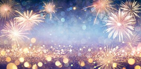 Abstract Golden Glitter Background With Fireworksの写真素材