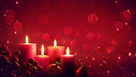 Four Red Candles With Christmas Ornament In Shiny Glitterの写真素材
