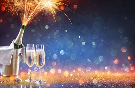 New Year Celebration With Champagne And Fireworks Popping In Bottle Color Trend 2020の写真素材