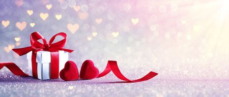 Valentines Celebration With Gift box With Defocused Lights In Shiny Backgroundの写真素材