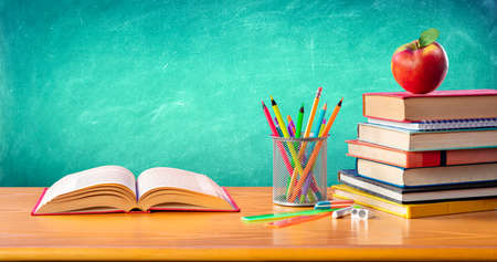 Apple On Stack Books With Supplies - Back To Schoolの写真素材