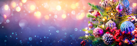 Abstract Christmas Card - Baubles On Snow With Fir Branches And Defocused Snowfall In Backgroundの写真素材