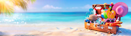 Beach Holiday - Travel Suitcase On Tropical Sand With Sunny Seaの写真素材