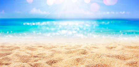 Beach - Sand With Abstract And Defocused Ocean In Backgroundの写真素材