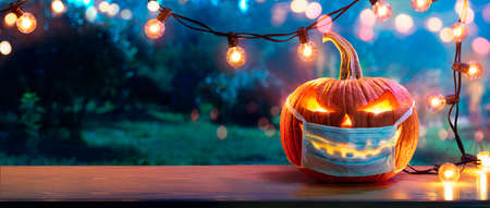 Pumpkin With Protective Mask - Halloween In Outdoorの写真素材