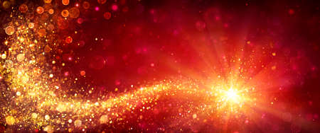 Christmas - Golden Star In Red Shiny Backgroundの写真素材