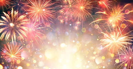 Fireworks With Golden Lights - Anniversary Celebration In Night With Abstract Defocused Bokehの写真素材