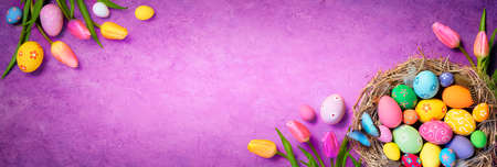 Easter Eggs - Tulips And Decorations On Velvet Violet Backgroundの写真素材