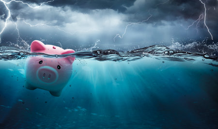 Piggy Bank At Risk To Drowning In Debt - Crisis Financial Banking Concept - Contain 3d Renderingの写真素材