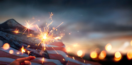 American Flag With Sparkler- 4th Of July - Independence Day And Memorial Day - Abstract Defocused Lightsの写真素材