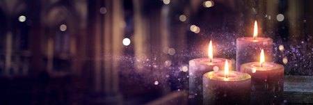 Advent Candles Burning In The Dark With Glitter On Flames And Abstract Defocused Lightsの写真素材