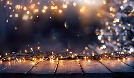 Christmas - Defocused String Light On Rustic Wooden Table In The Night With Abstract Treeの写真素材