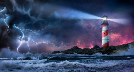 Lighthouse In Storm - Leader And Vision Concept - Landscape With Milky Way Against Dramatic Skyの写真素材