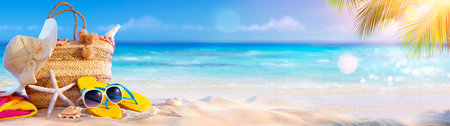 Summer Vacation - Accessories In Bag In Tropical Beach With Defocused Oceanの写真素材