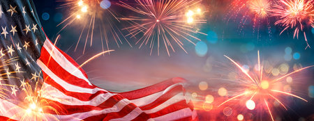 Independence Day - USA Flag And Fireworks At Night - Abstract Bokeh Light Effectsの写真素材