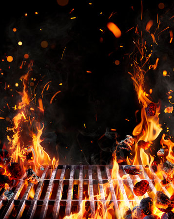 Bbq Grill - Embers Or Barbecue In Motion With Flames And Jumping Coal With Abstract Sparks - Fire On Charcoal In Nightの写真素材