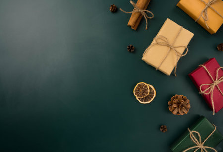Christmas gifts on a dark green backgroundの写真素材