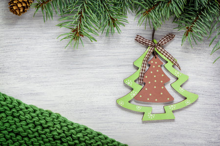 Spruce branches on a dark vintage wooden background. christmas conceptの写真素材