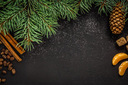New Year`s black background. cones and spruce branches on the tableの写真素材
