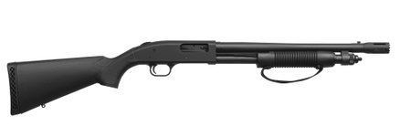 Pump-action 12 gauge shotgun isolated on a white background. A smooth-bore weapon with a wooden stock.の写真素材