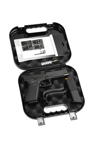 Modern semi-automatic pistol. A short-barreled weapon for self-defense. Arming the police, special units and the army. Weapon in a case for storage and transportation. Isolate on a white background.の写真素材