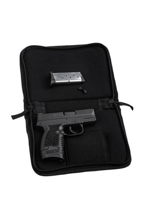 Modern semi-automatic pistol isolate on a white background. Armament for the army and police. Short-barreled weapon.の写真素材