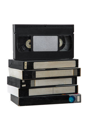 Pile of VHS video cassettes. vintage media. Isolate on a white background.の写真素材