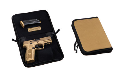 Modern semi-automatic pistol isolate on a white background. Armament for the army and police. Short-barreled coyote-colored weapon.の写真素材