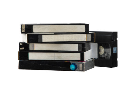 Pile of VHS video cassettes. vintage media. Isolate on a white background.の写真素材