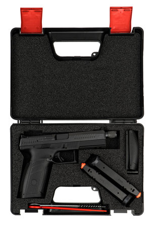 Modern semi-automatic pistol. A short-barreled weapon for self-defense. Arming the police, special units and the army. Weapon in a case for storage and transportation. Isolate on a white background.の写真素材