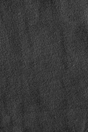 Texture of warm woolen fabric. Gray felt background.の写真素材