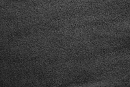 Texture of warm woolen fabric. Gray felt background.の写真素材