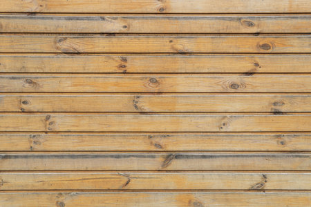 Light wooden background. Rough boards. Natural wood texture and pattern.の写真素材