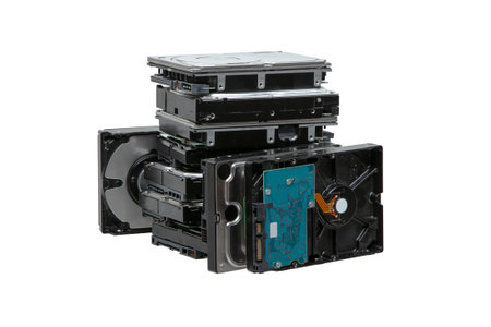 Hard drives stacked on top of each other. SATA 3.5 HDD for information storage. Isolate on a white background.の写真素材
