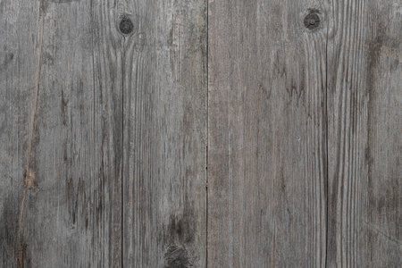 Texture of an old wooden board. Light vintage background.の写真素材