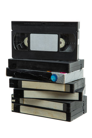 Pile of VHS video cassettes. vintage media. Isolate on a white background.の写真素材