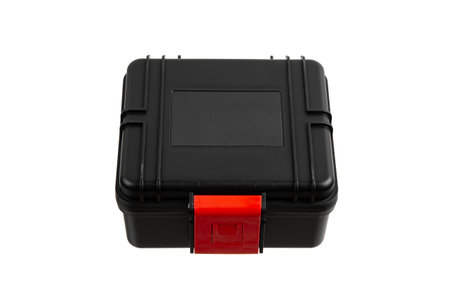 Black plastic container with foam inside for safe storage and transportation of fragile and expensive items. Sturdy plastic case. Isolate on a white background.の写真素材