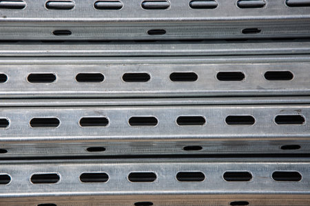 Pile steel channel for construction of a house to an outdoor site. Steel beams for the roof. Profile pipesの写真素材