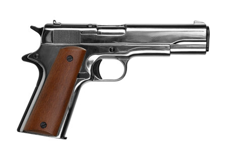 Silver semi-automatic pistol with wooden handle. Isolate on white background.の写真素材
