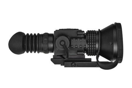 Modern black digital thermal imaging scope with a rubber eyecup and mounting rail, isolated on white.の写真素材
