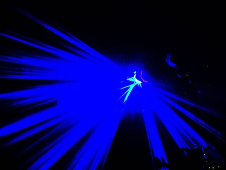Rays of blue lights with aquamarine centerの写真素材