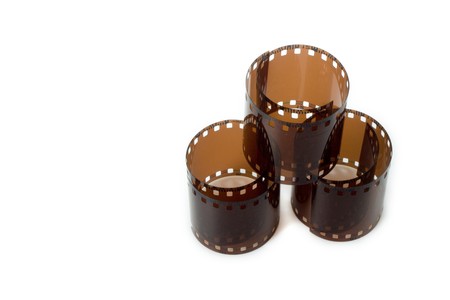 35 mm analog photogtaphy fiim. in blanck. isolated in white. horizontal image.の写真素材