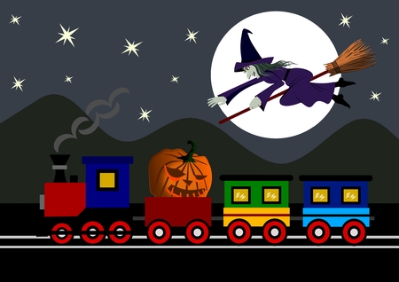 Train with Halloween pumpkins and a witch on a broomstickの写真素材