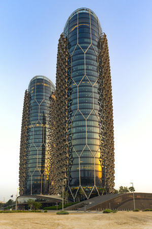 Abu Dhabi, United Arab Emirates - Apr.14, 2017: Al Bahr Towers - paired towers - skyscrapers built by the architect Jean Nouvel. Innovative facade in the style of Mashrabiyaのeditorial素材