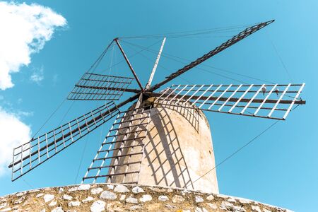 Traditionally windmill on a clear sunny day, Palma de Mallorca, Spain, Apr.2019