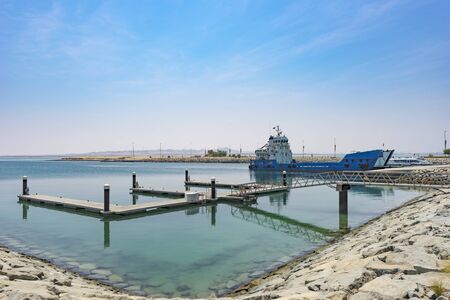 Cargo Ship in a Quiet Harbor