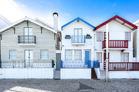 Cute facades of houses. Costa Nova Beach, Aveiro, Portugal, Nov2019の写真素材